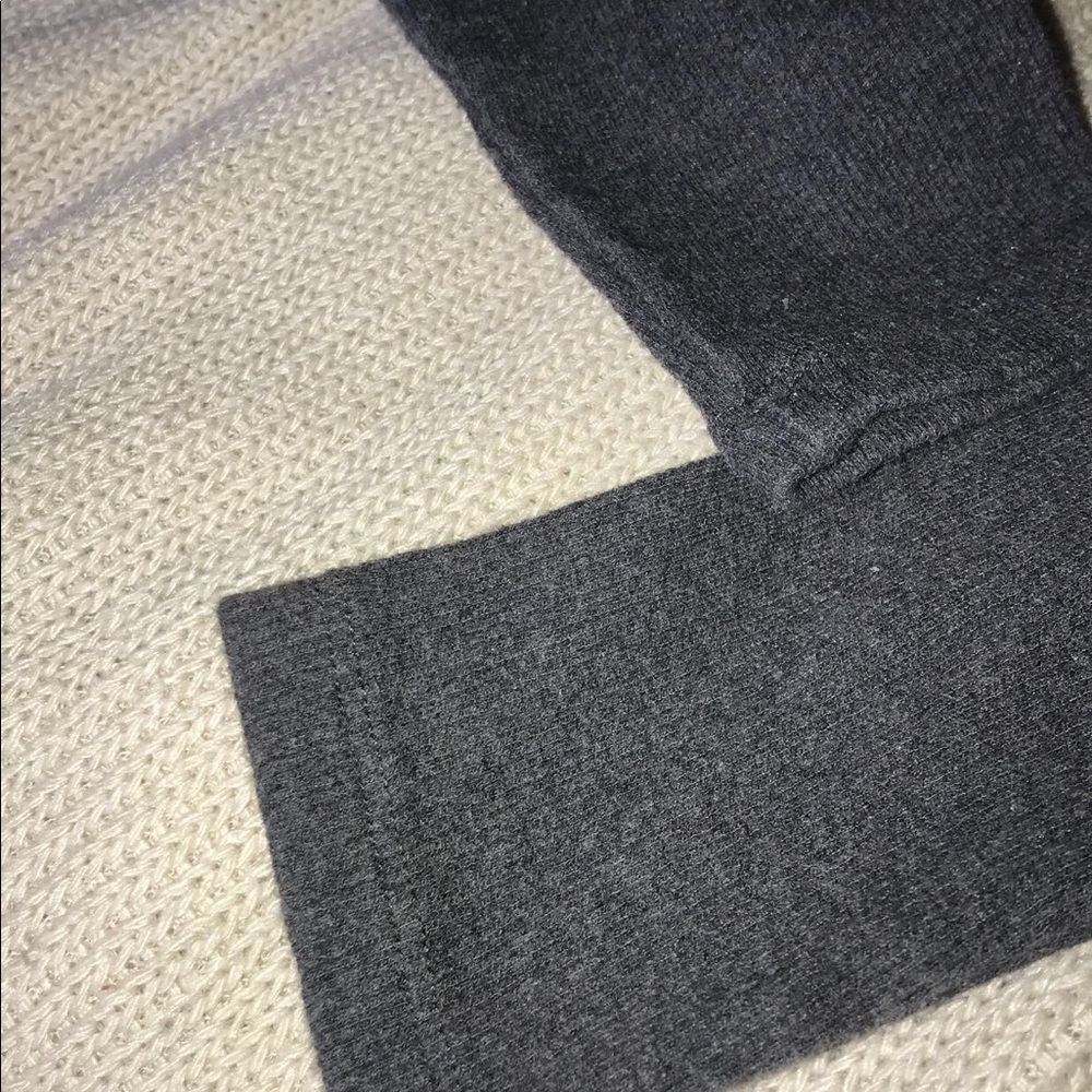 Very comfy body is loose but sleeve fit tight.